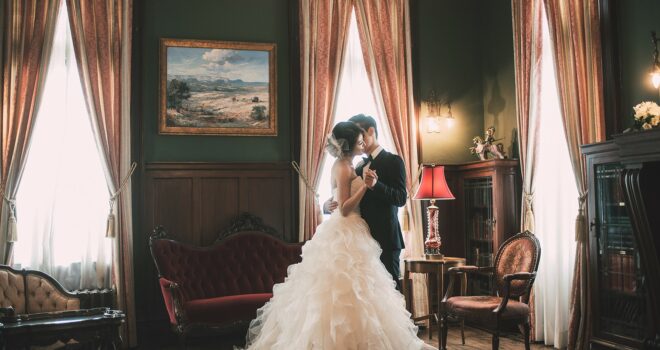 Bride and groom in library at the Alexander Mansion, Dallas, Texas