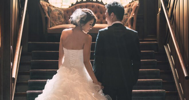 Bride and Groom on the grand stair
