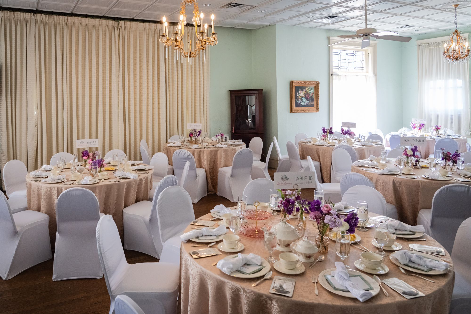 Ballroom setup for afternoon tea at a charity event at the Alexander Mansion Ballroom setup for afternoon tea at a charity event at the Alexander Mansion
